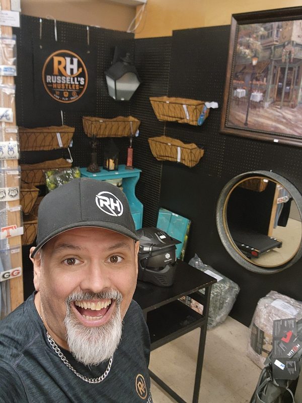 The Russell's Hustles booth, stocked with furniture and finds
